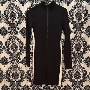 Fashion Nova Black and White Romper Sleek Design